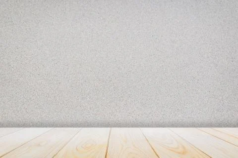 Empty wooden deck table over surface marble stone pattern at the wall background Foto stock