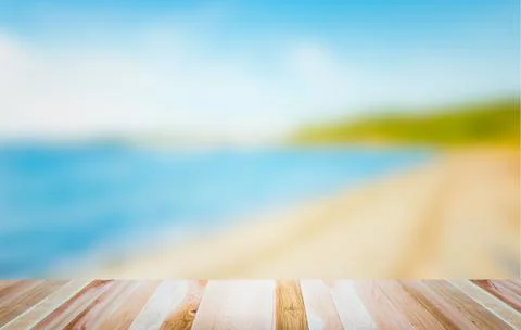 Empty wooden deck table top Ready for product display montage with sea,beach, Stock Photos