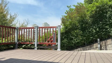 Empty Wooden Observation Deck with Red Railings in Green Seoul Park Stock Footage 338301283