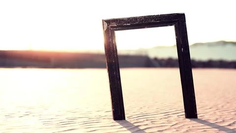 Empty wooden picture frame on the beach sand Stock Illustration