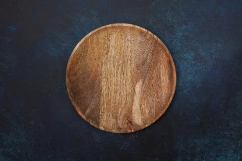 Empty wooden plate Stock Photos