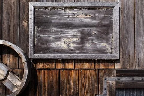 Empty wooden sign on a wall 스톡 사진