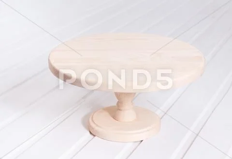 Empty wooden stand for cake Stock Photos