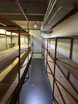 Empty wooden storage shelves Stock Photos