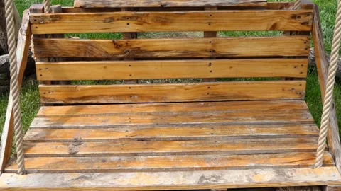 Empty wooden swing in the park Stock-Footage 240952485
