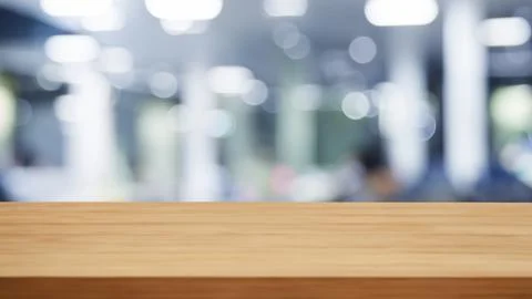 Empty wooden table and background of modern office interior, product montage Stock Photos