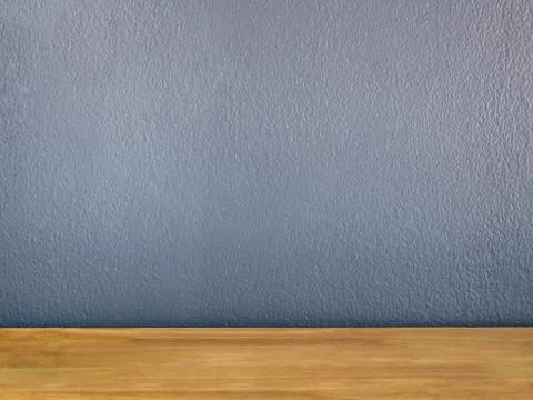 Empty wooden table and gray cement wall Stock Photos