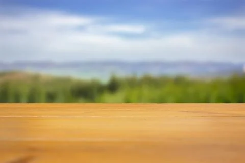 Empty wooden table on the background of a blurred mountain landscape. 스톡 사진