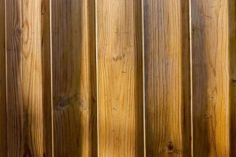 Empty wooden table background texture with sunlight on surface, top view. Stock Photos