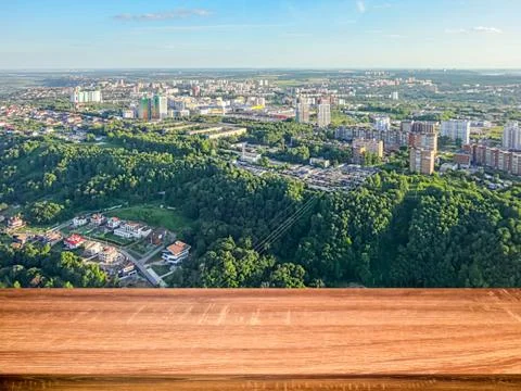 Empty wooden table with blurred background of aerial view of the the Nizhny N Stock Photos