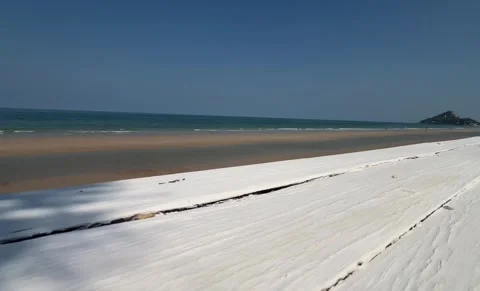 Empty wooden table the blurred ocean beach background, product display Stock Footage 339862932