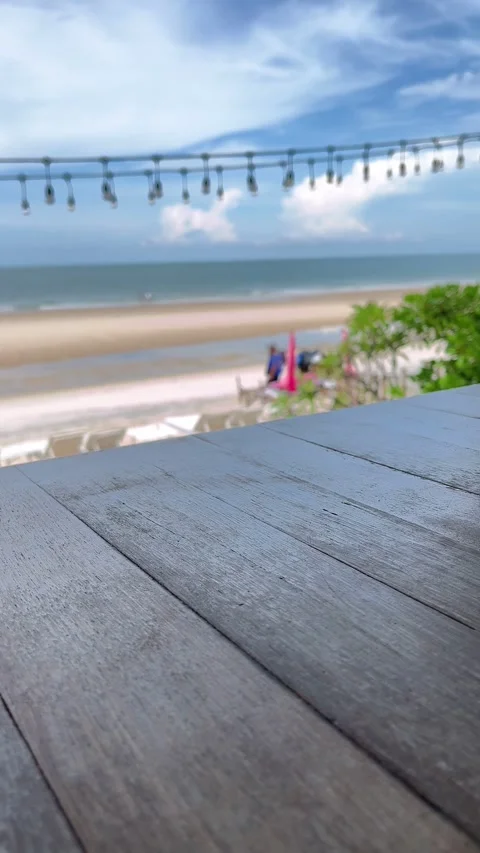 Empty wooden table the blurred ocean beach background, product display Stock Footage 340452444