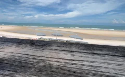 Empty wooden table the blurred ocean beach background, product display Видео 341176581