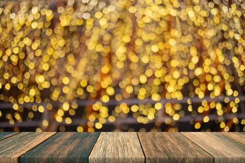 Empty wooden table of brown on front blurred colorful background, for present Stock Photos