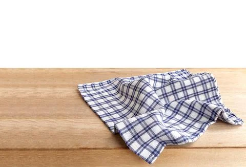 Empty wooden table with checkered tablecloth on white background  Stock Photos