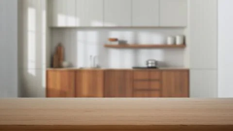 Empty wooden table, desk or shelf with blurred view of japandi scandinavian k Illustrazione stock