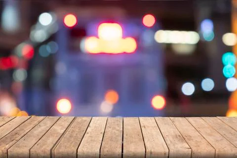 Empty wooden table in front abstract blurred bokeh colorful background, used  Stock Photos