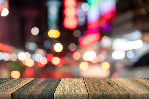 Empty wooden table in front abstract blurred bokeh colorful background, used  Stock Photos
