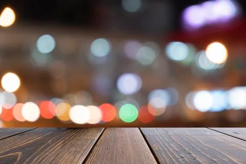 Empty wooden table in front abstract blurred bokeh colorful background, used  Stock Photos
