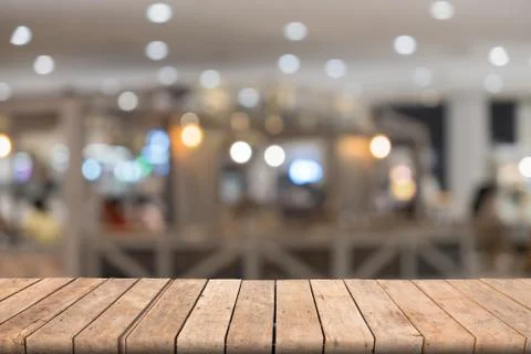 Empty wooden table in front blurred yellow background, for presentation and t 库存照片