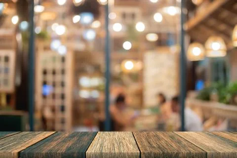 Empty wooden table in front blurred background, for template and background Stock Photos