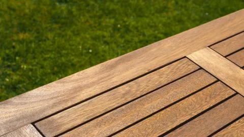 Empty wooden table on grass Stock Photos