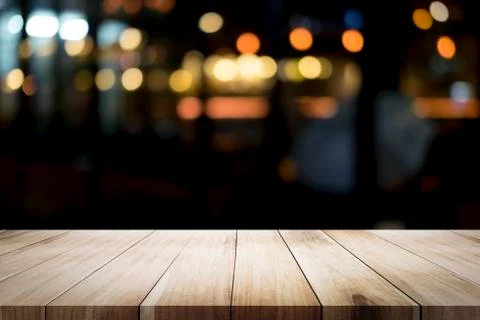 Empty wooden table platform and bokeh at night Stock Photos
