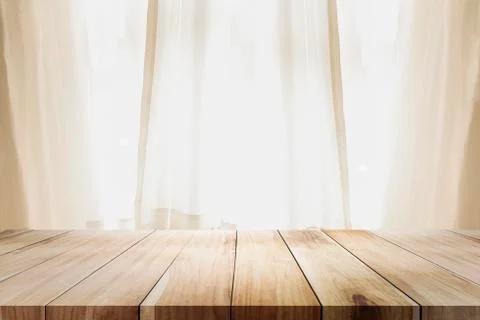 Empty wooden table platform and bokeh at night. Stock Photos