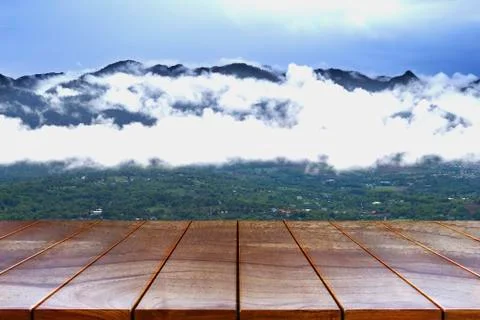 Empty wooden table space platform and Mountain and sky background for product 스톡 사진