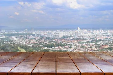 Empty wooden table space platform and City view and sky background for produc 스톡 사진