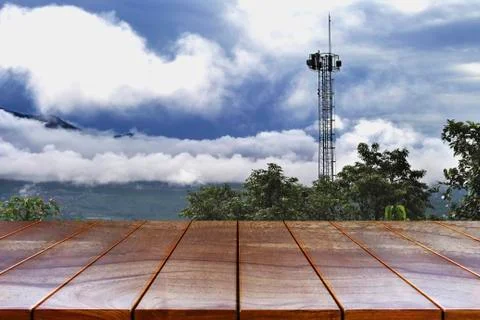 Empty wooden table space platform and Mountain and sky background for product Stock Photos