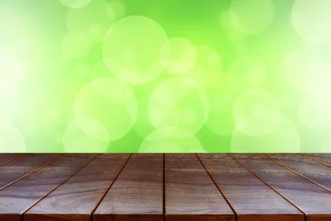 Empty wooden table space platform and blurred abstract bokeh background for p Stock Photos