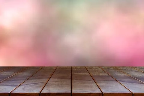 Empty wooden table space platform and blurred abstract bokeh background for p Stock Photos