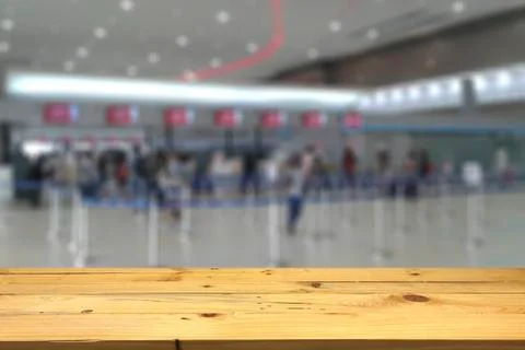 Empty wooden table space platform and blurred Counter check-in background for Stock Photos