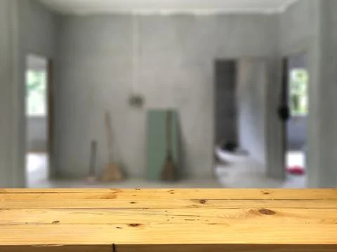 Empty wooden table space platform and blurred Home construction background fo 스톡 사진