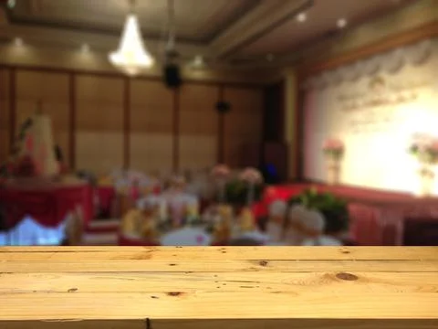 Empty wooden table space platform and blurred Wedding room background for pro Stock Photos