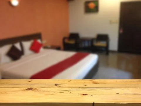 Empty wooden table space platform and blurred Bedroom in the hotel background 스톡 사진
