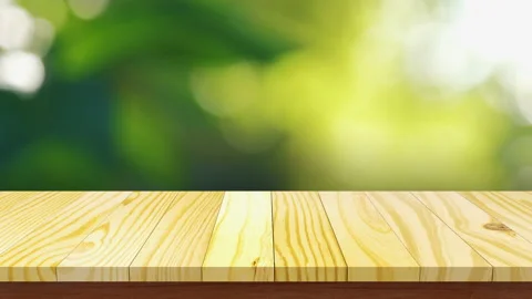 Empty wooden table top with abstract natural blur bokeh background Stock Footage 155216030