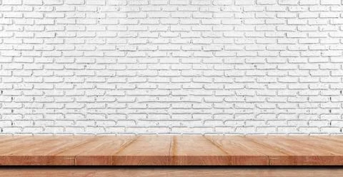 Empty wooden table top, counter or shelf on white brick wall background, For  Stock Photos