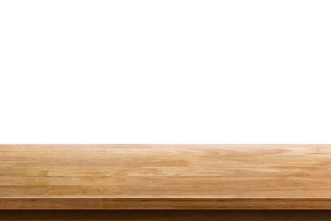 Empty wooden table top isolated on white background, used for display or mo.. Stock Photos