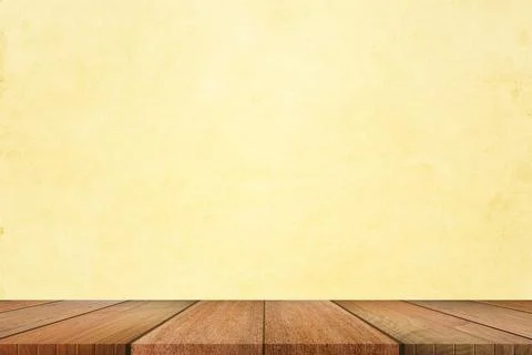 Empty of wooden table top on light yellow pastel color background. For your p Stock Illustration