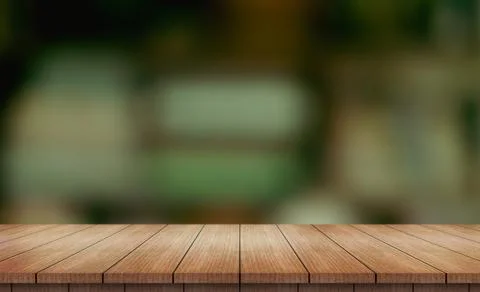 Empty wooden table top with lights bokeh on blur restaurant background (3) Photos
