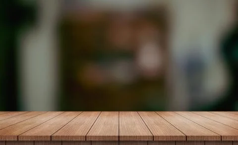 Empty wooden table top with lights bokeh on blur restaurant background (5) Photos