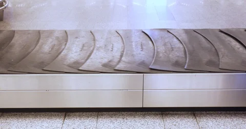 Empty Working Baggage Claim Conveyor Stock Footage 104197852