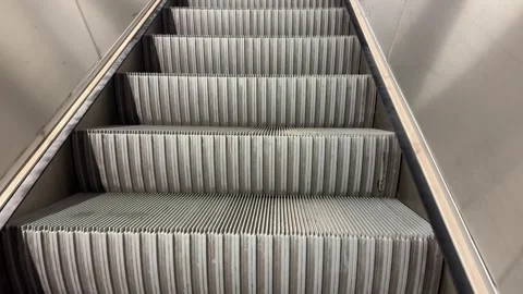 Empty working escalator upstairs moving up Stock Footage 260243218