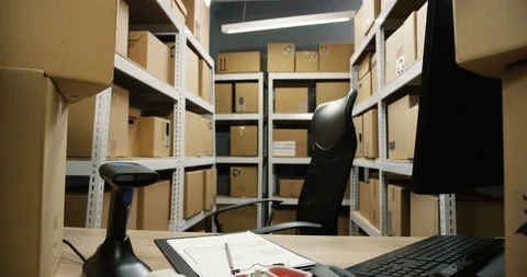 Empty working place of postman and courier. Table and chair at post office Stock Footage 125208794