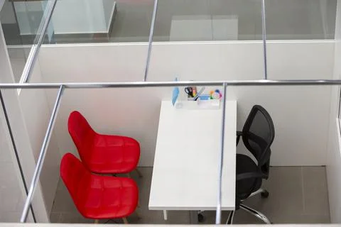 Empty workplace with white table Stock Photos