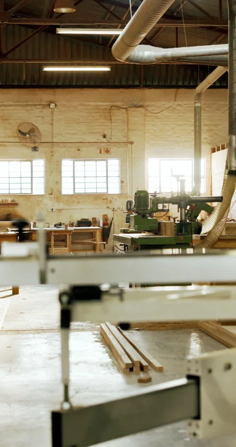 Empty, workshop and wood with machinery for carpentry, furniture restoration and Stock Footage 340778272