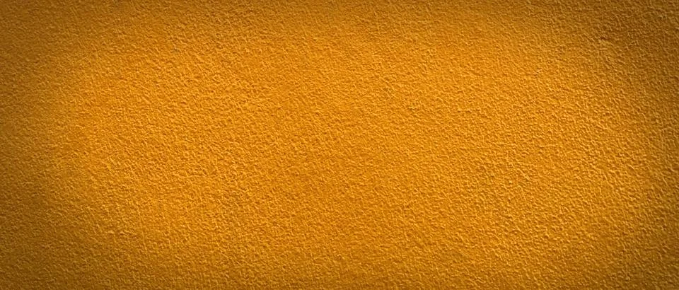 Empty yellow cement wall texture background with pattern and copy space for d Foto stock