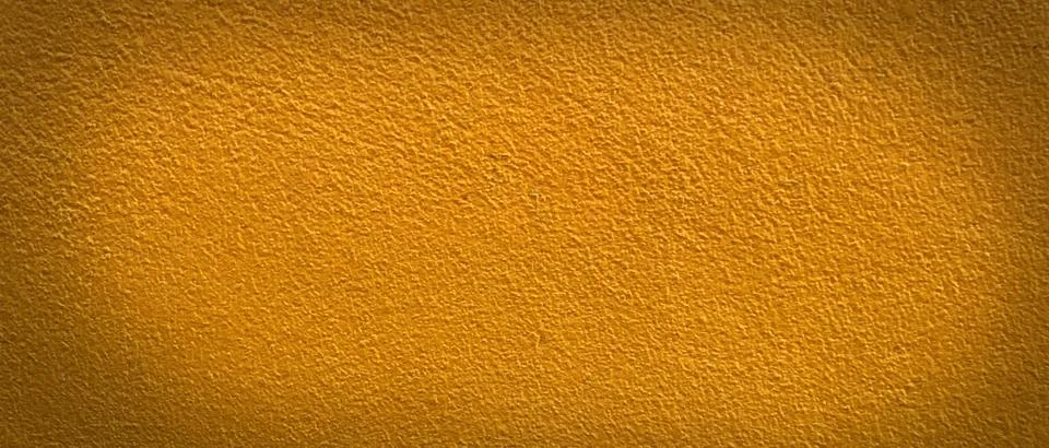 Empty yellow cement wall texture background with pattern and copy space for d Stock Photos